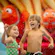 A little boy and girl play in a swimming pool at Disney’s Art of Animation Resort